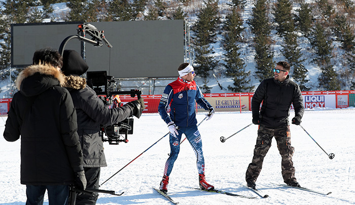In this photo provided by the Korean Culture and Information Service, actor Jonathan Bennett (R) receives skiing tips from American cross-country skier Andrew Newell at the PyeongChang Alpensia Cross-Country Skiing Center on Feb. 2, 2017. The two are being filmed for NBC's videos previewing the 2018 PyeongChang Winter Olympics.